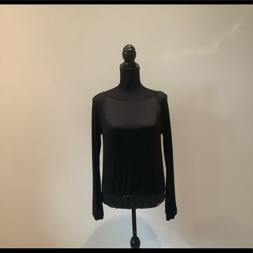 Blumarine tees long sleeve with leather on the bottom is in great condition.